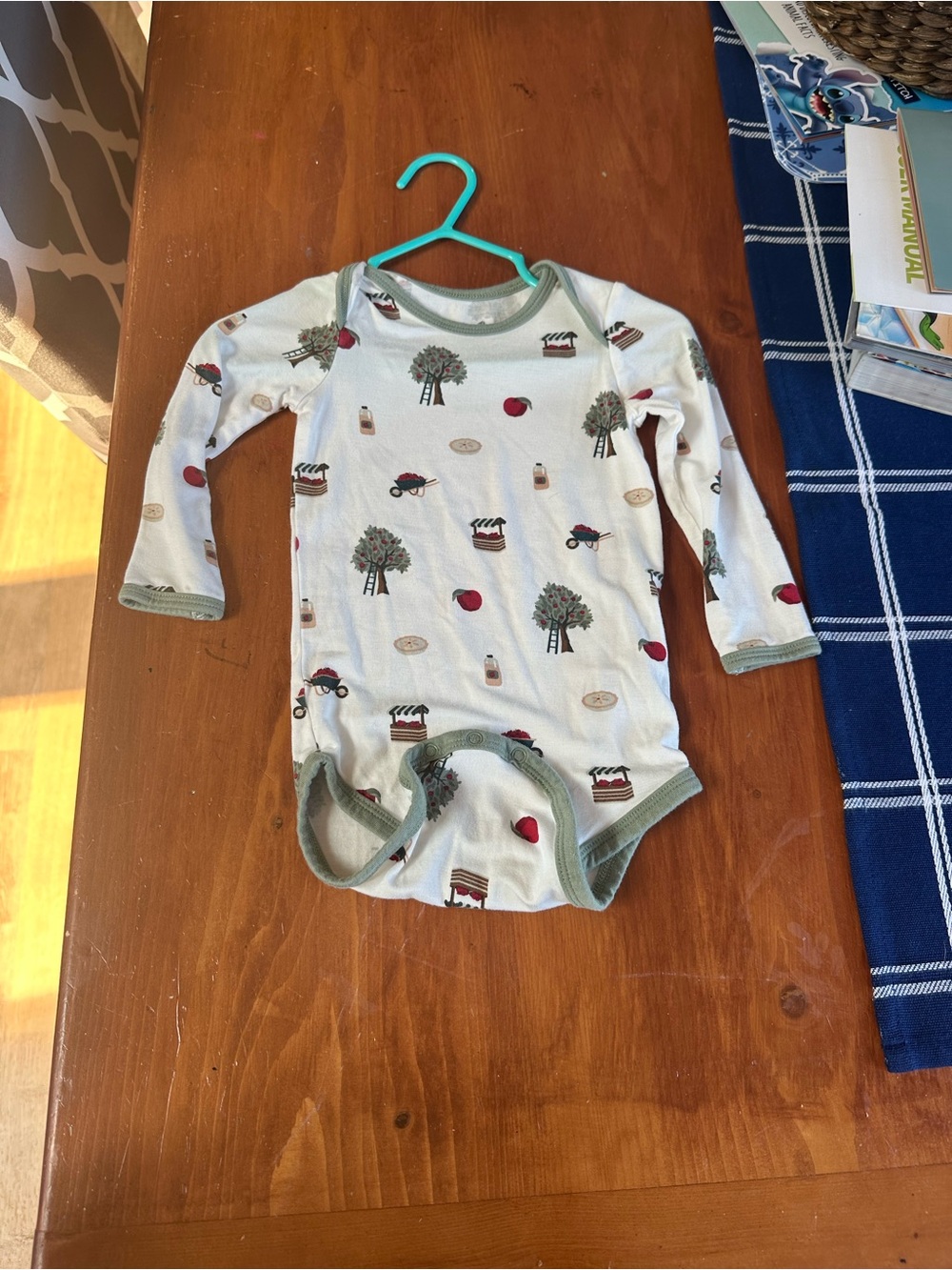 Kyte BABY Cream One-Piece Bodysuit with Green Trim and Farm Print